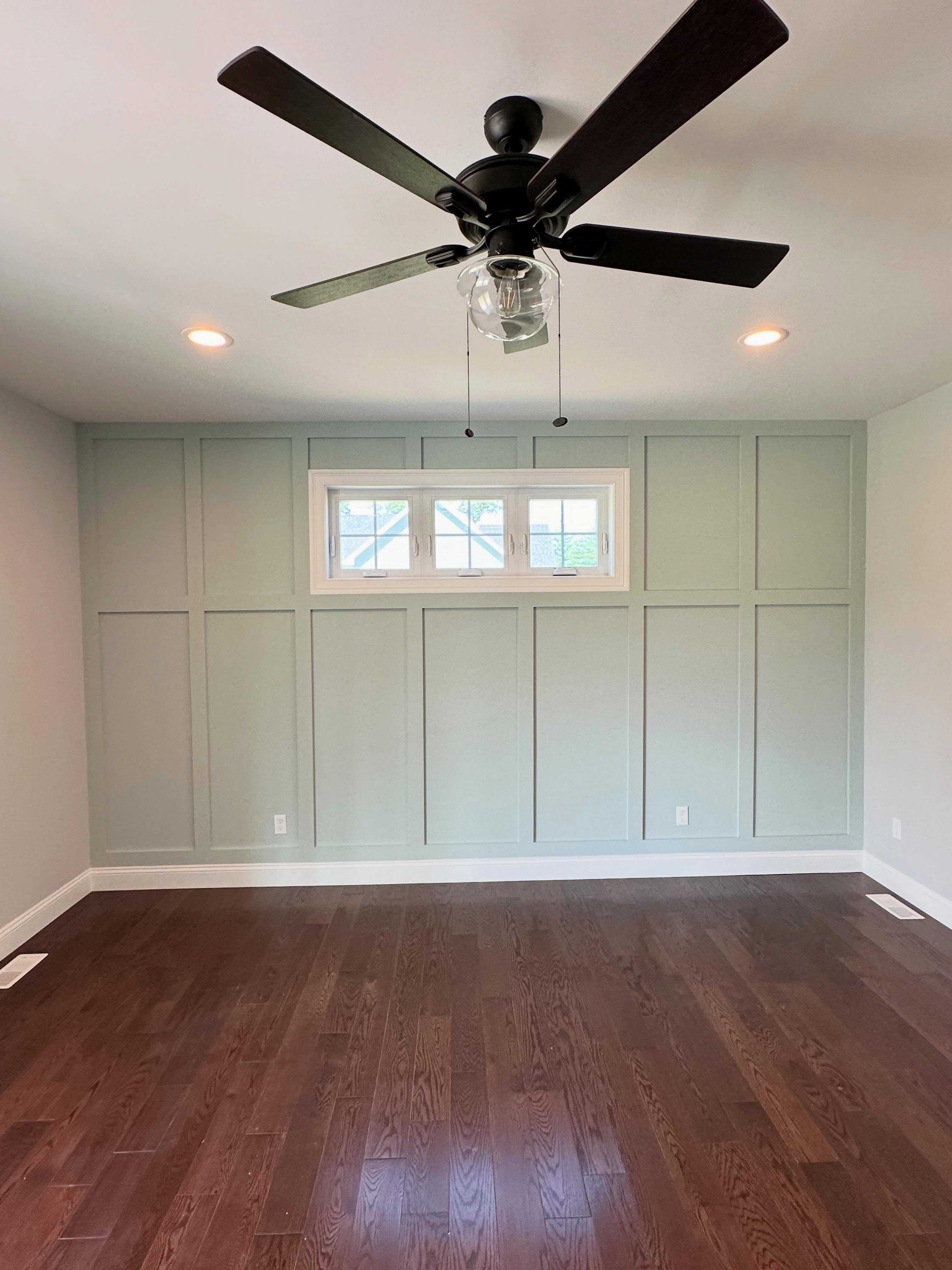Board-and-batten accent wall in bedroom